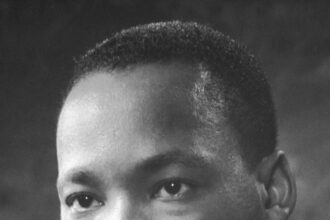 Portrait of Dr. Martin Luther King Jr., a prominent civil rights leader known for his nonviolent activism and his 'I Have a Dream' speech.