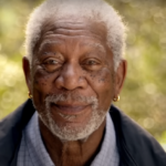 Morgan Freeman smiling warmly, showcasing his timeless charm and wisdom.