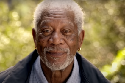 Morgan Freeman smiling warmly, showcasing his timeless charm and wisdom.