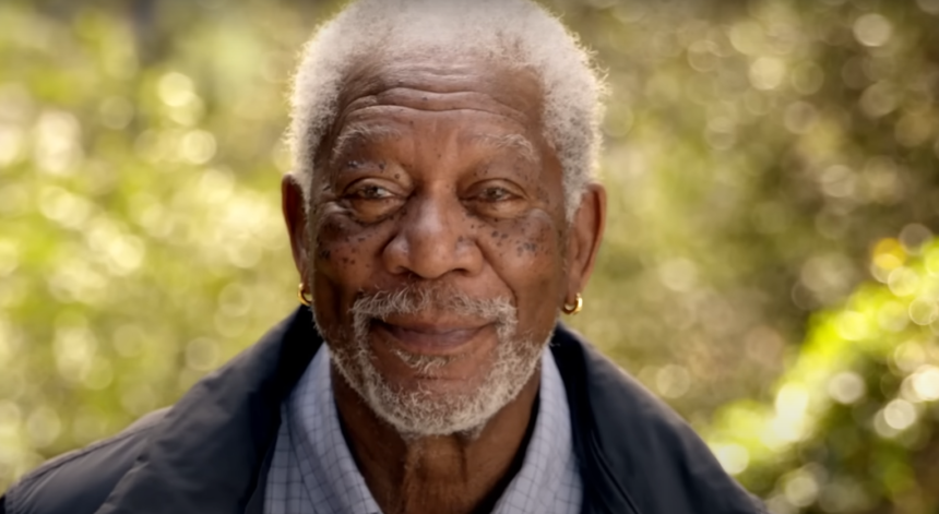 Morgan Freeman smiling warmly, showcasing his timeless charm and wisdom.