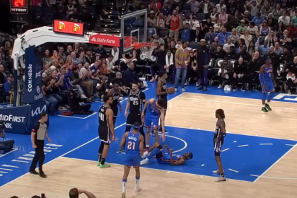 Shai Gilgeous-Alexander in action during an NBA game, showcasing his elite basketball skills.