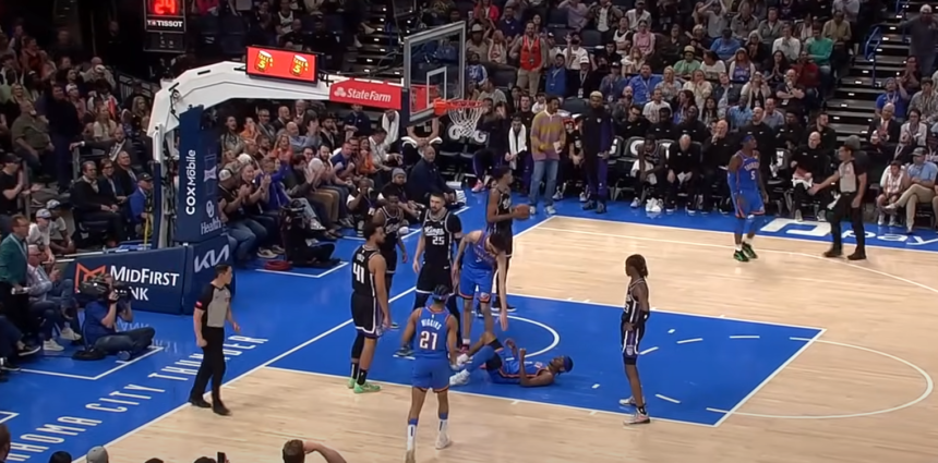 Shai Gilgeous-Alexander in action during an NBA game, showcasing his elite basketball skills.