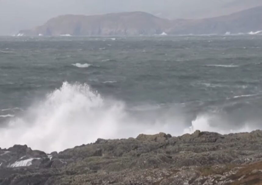 Rough seas with large waves crashing against the rocks, highlighting the impact of Storm Herminia in coastal areas of the UK