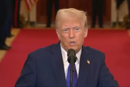 President Donald Trump speaking during a televised address, announcing his decision regarding Guantanamo Bay and immigration policy.