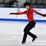 Figure skater performing on ice, symbolizing the memory and legacy of Spencer Lane in the figure skating community.