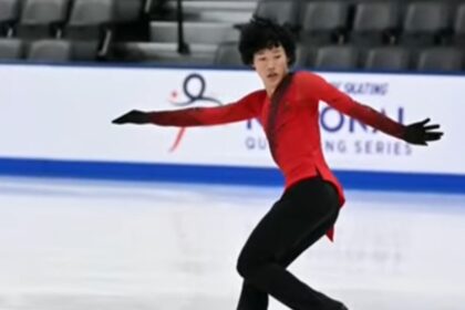 Figure skater performing on ice, symbolizing the memory and legacy of Spencer Lane in the figure skating community.