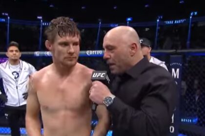 UFC fighter Bryce Mitchell inside the octagon, speaking to Joe Rogan after a fight, amidst growing controversy over his recent remarks.