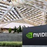 Nvidia logo displayed in a modern tech conference environment