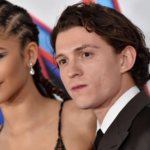 Tom Holland and Zendaya attending a red carpet event, looking elegant and happy together.