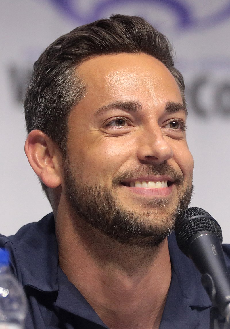 Zachary Levi speaking at a press event, discussing his upcoming film The Unbreakable Boy and addressing political corruption in Hollywood