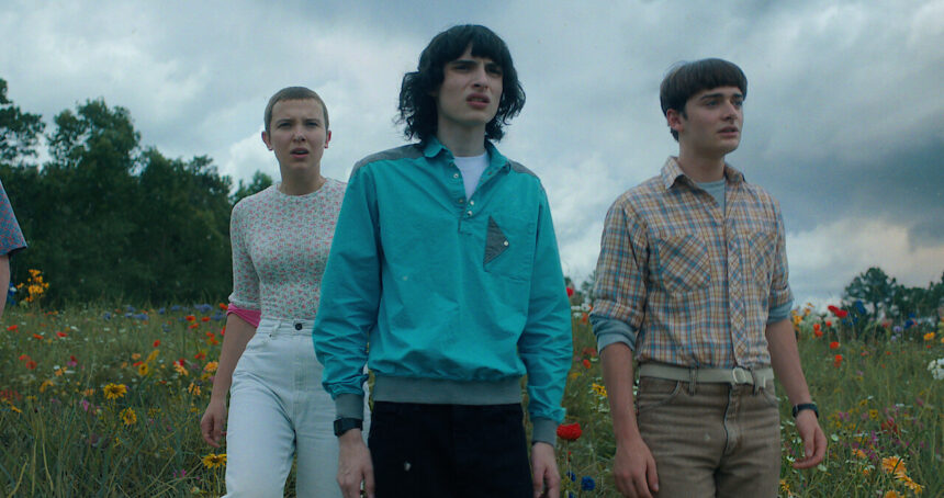 Mike Wheeler and other Stranger Things characters in a tense scene from the upcoming final season.