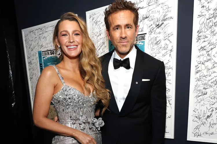 Blake Lively and Ryan Reynolds attending a red carpet event, amid ongoing legal drama involving Justin Baldoni and defamation lawsuits in Hollywood.