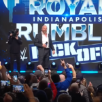 WWE Royal Rumble 2025 event with a packed audience and stage setup