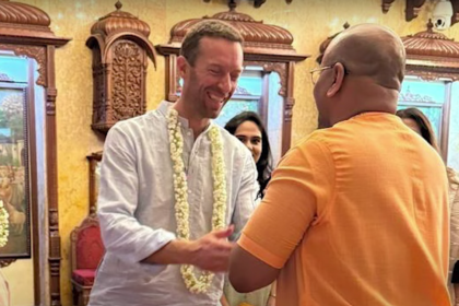 Chris Martin participating in the Mahakumbh 2025, engaging in spiritual discussions with Hindu monks.