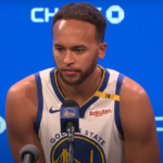 Golden State Warriors player speaking at a press conference following the blockbuster NBA trade involving Jimmy Butler, Kyle Anderson, and Andrew Wiggins.