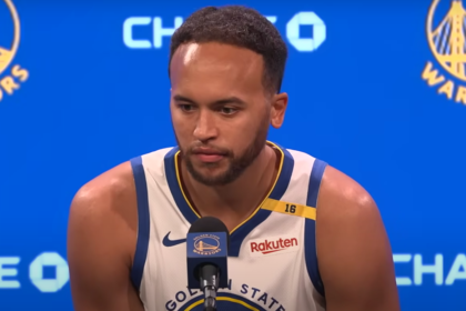 Golden State Warriors player speaking at a press conference following the blockbuster NBA trade involving Jimmy Butler, Kyle Anderson, and Andrew Wiggins.