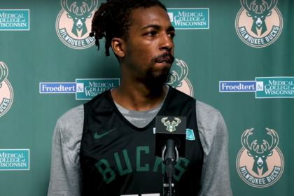 Delon Wright in a Milwaukee Bucks jersey at a press conference before being traded to the New York Knicks in a pre-trade deadline deal.