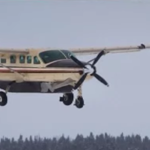 Small aircraft taking off from a remote Alaskan airstrip, symbolizing aviation in rugged terrain.