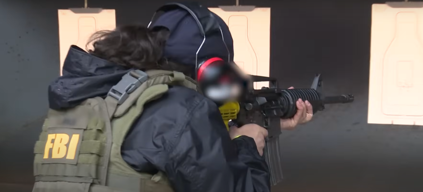 FBI agent in tactical gear conducting an operation