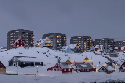 Snow-covered cityscape in Greenland during winter.