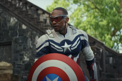 Sam Wilson as the new Captain America, wearing his suit and holding the shield, symbolizing his role in Captain America: Brave New World.