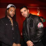 Drake and PARTYNEXTDOOR posing together at an event, celebrating the release of their collaborative album '$ome $exy $ongs 4 U' on February 14, 2025