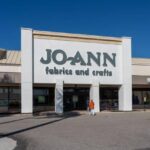 Joann Fabrics store entrance with signage, symbolizing upcoming store closures due to bankruptcy.