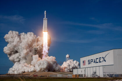 SpaceX Falcon 9 rocket launch taking off from the launch pad.