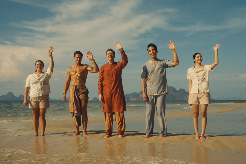 Cast of The White Lotus Season 3 standing on a beach in Thailand, set against a dramatic sunset, representing the show’s new exotic and mysterious setting.