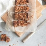 A stack of granola bars on parchment paper, representing the recent FDA recall due to contamination concerns.