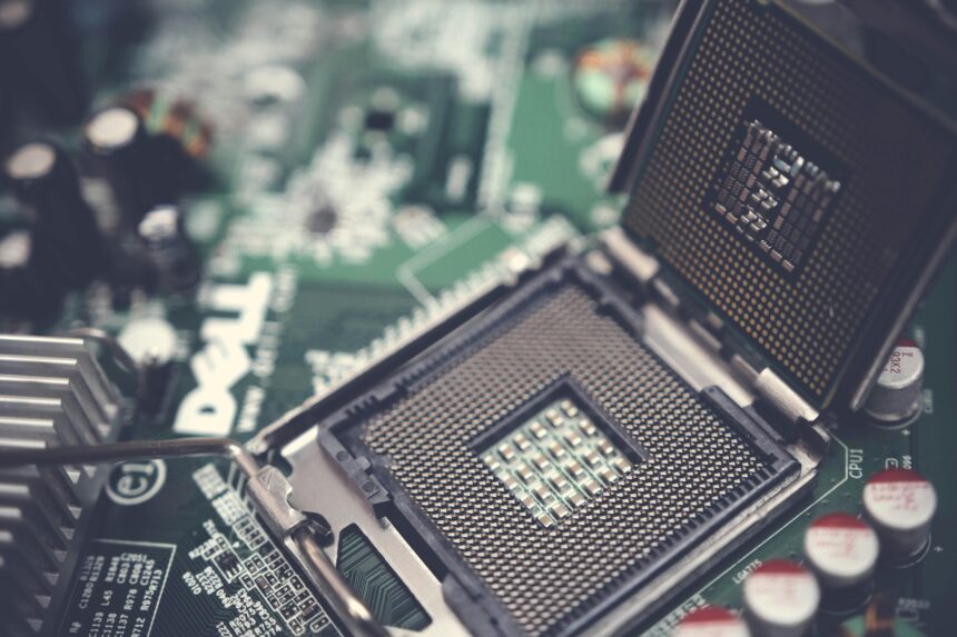 Close-up of a computer processor on a motherboard, representing Microsoft's decision to drop support for Intel’s 10th Gen processors.