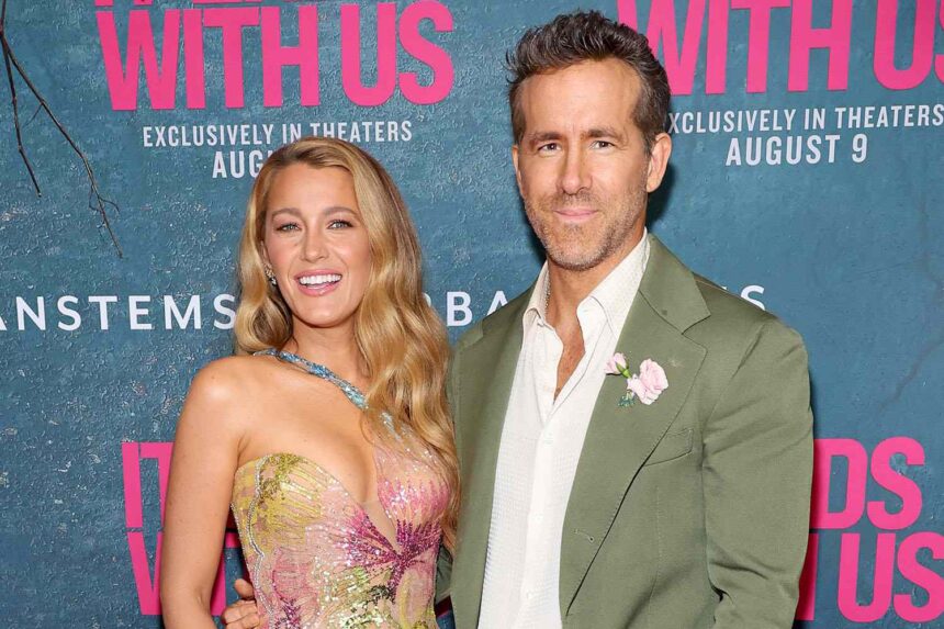 Blake Lively and Ryan Reynolds pose together at a red carpet event, representing their Hollywood success and billion-dollar business empire.